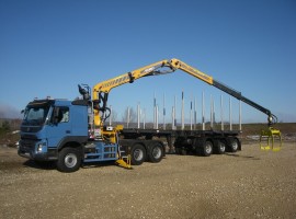Forestry equipment for Steered 3 axles extendable semi-trailer Volvo 6x4 + crane Tajfun-Liv 300K99