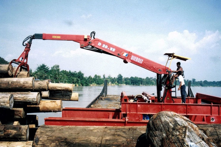 Crane on conveyor or barge