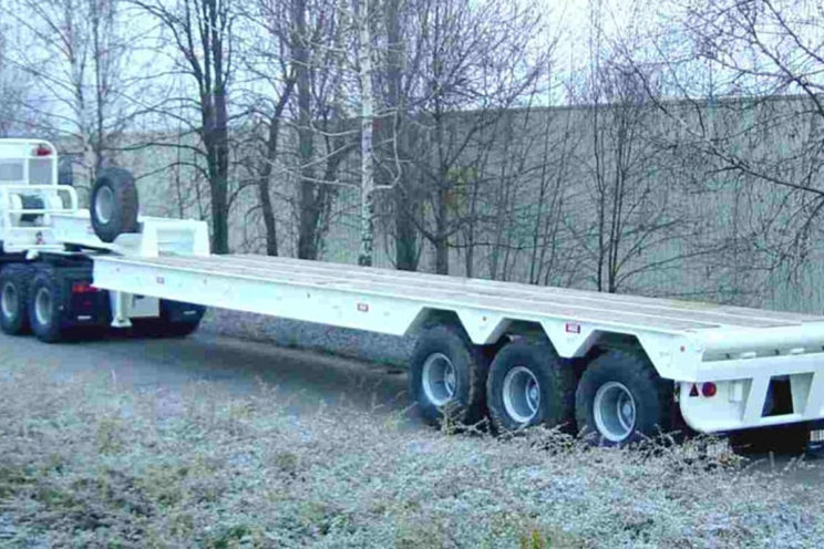 2 or 3 axles semi-trailer for transport of pipelines of different diameter and length